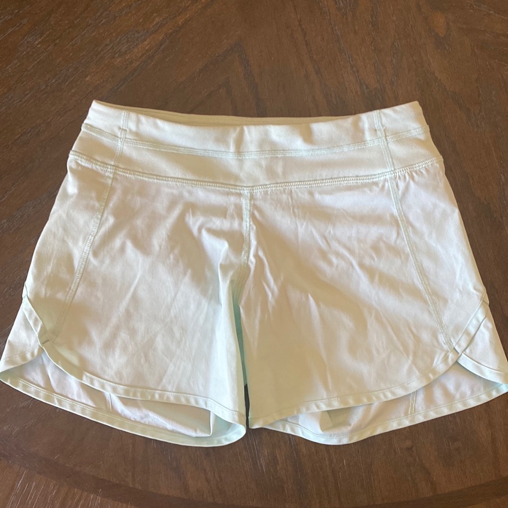 4 inch ivivva running shorts, teal color, size 12 kids
